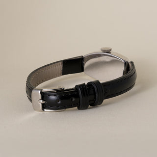 Art Deco Ladies Rolex 9K Gold Tonneau Shape on Black Thin Leather Strap