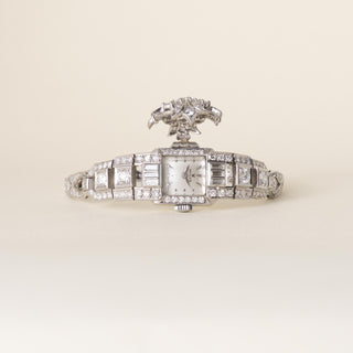 Vintage Rolex Platinum and 6 Carats Diamond Concealed Watch Cocktail Bracelet