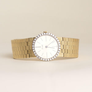 Vintage 1970s Ladies Piaget 18K Yellow Gold Diamond Bezel Watch