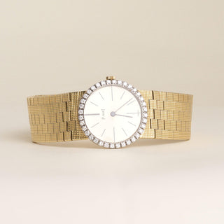 Vintage 1970s Ladies Piaget 18K Yellow Gold Diamond Bezel Watch