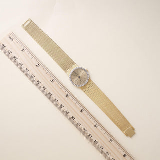 Vintage 1970s Ladies Piaget 18K Yellow Gold Diamond Bezel Watch