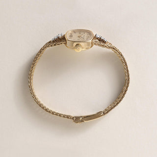 Vintage 14K Gold Ladies Classique Rolex Watch With Diamonds