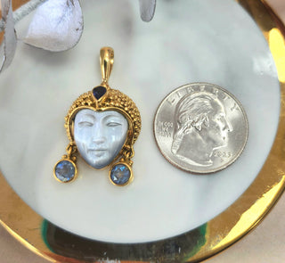 18K Yellow Gold Sajen Bali Goddess Carved Mother of Pearl, Sapphire Pendant
