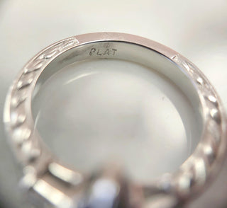 Stunning 2 Carat Pear-Shaped Sapphire Ring with Diamond Accents in Platinum