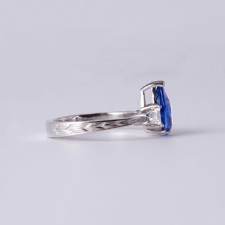Stunning 2 Carat Pear-Shaped Sapphire Ring with Diamond Accents in Platinum