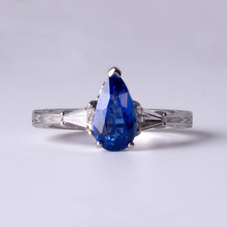 Stunning 2 Carat Pear-Shaped Sapphire Ring with Diamond Accents in Platinum