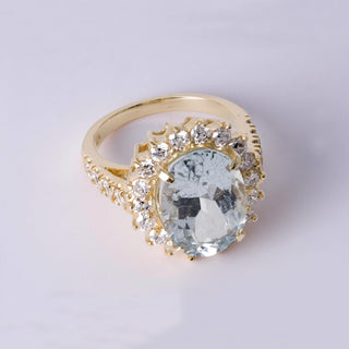 Vintage 14K Yellow Gold 5.27 Carat Oval Aquamarine & Diamond Halo Ring