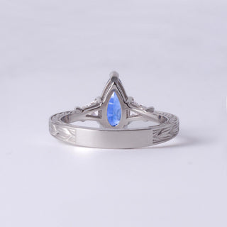 Stunning 2 Carat Pear-Shaped Sapphire Ring with Diamond Accents in Platinum