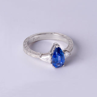 Stunning 2 Carat Pear-Shaped Sapphire Ring with Diamond Accents in Platinum